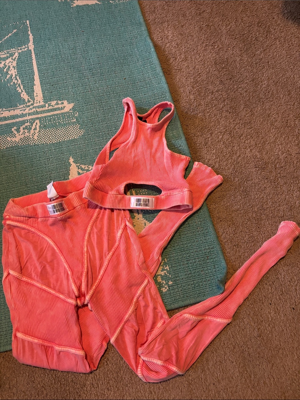 ALO Yoga pink ribbed racerback crop top and high-waist leggings set
